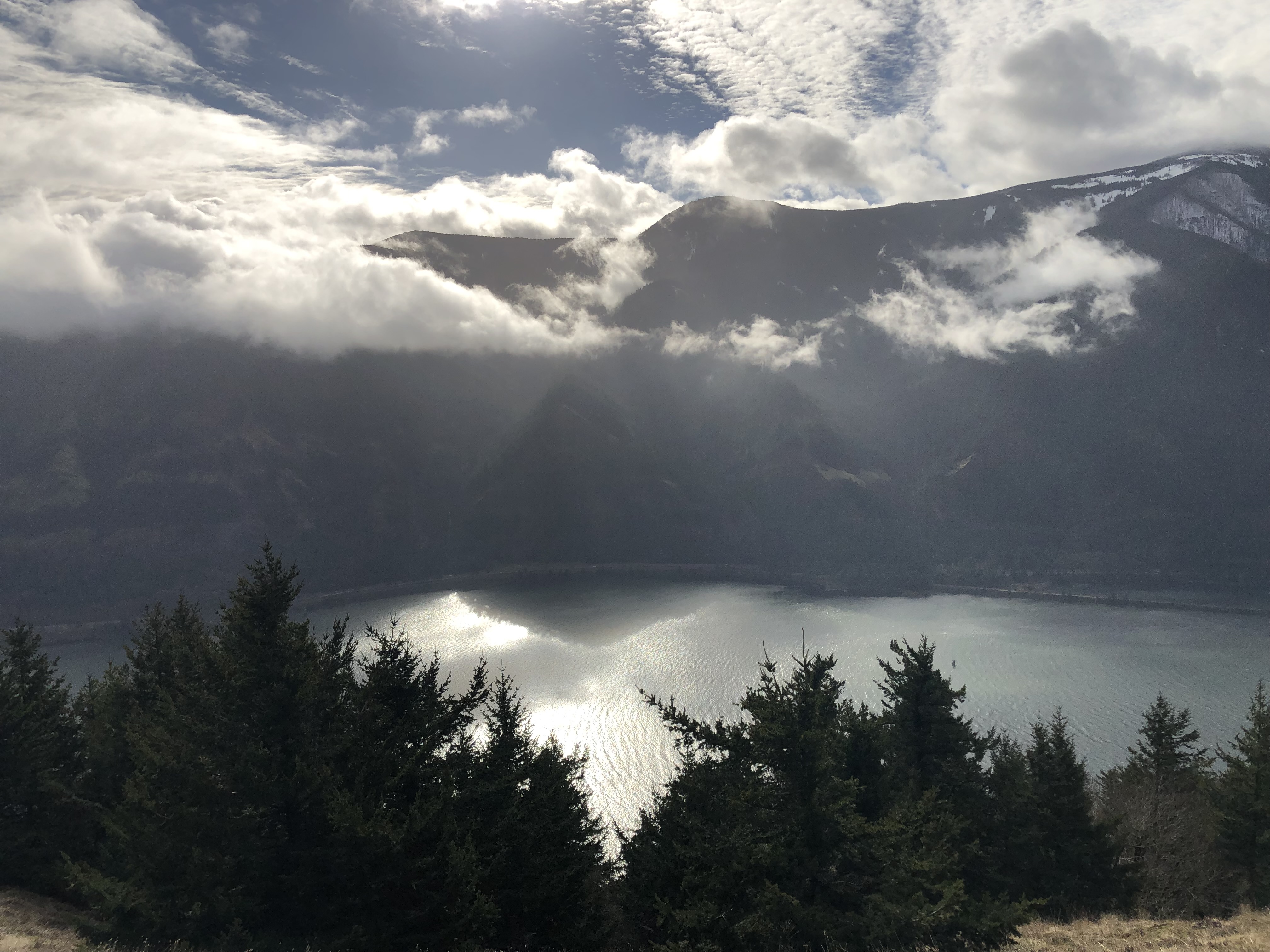 The Columbia River, sun, and clouds